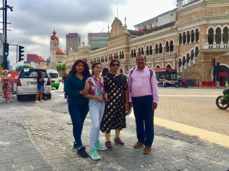 Family at Sultan Abdul Samad Building in Merdeka Square KL