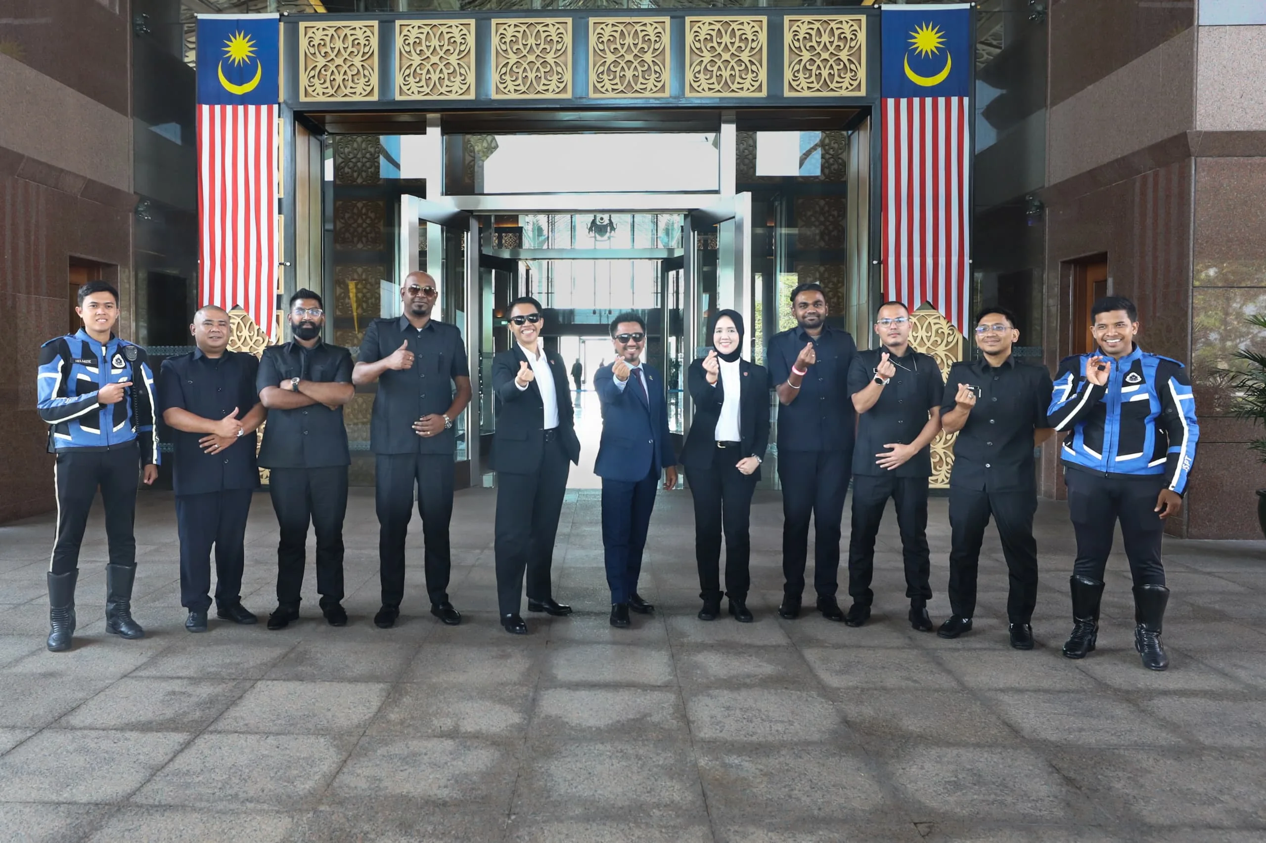 JeyRey driver team at Malaysian Parliament building